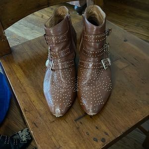 Jeffrey Campbell used booties. Some wear and tear as shown in pics